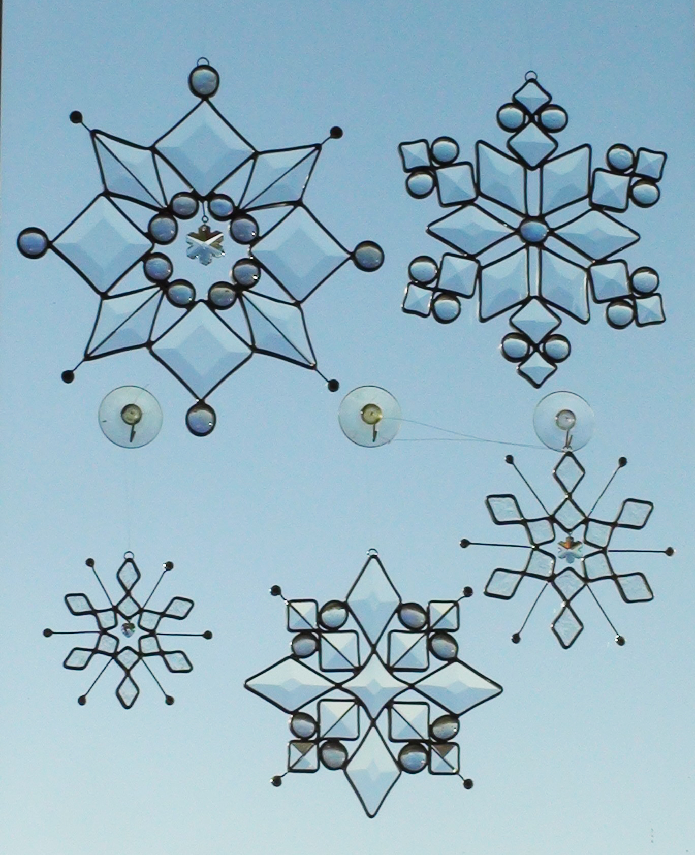 Variety of Beveled and Cut Glass Stained Glass Snowflake Suncatchers